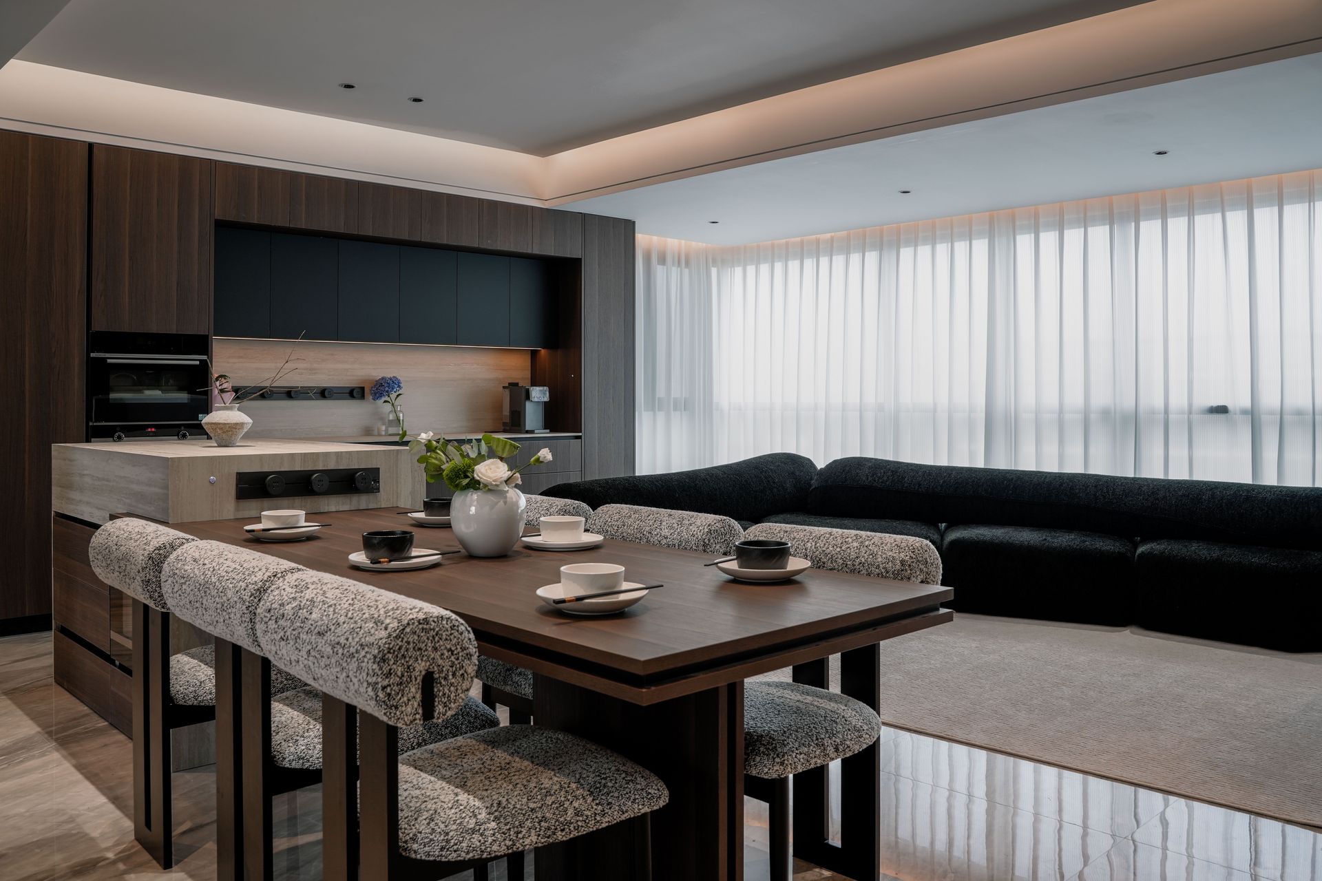 Sleek minimalist apartment interior with luxury furniture and contemporary design elements.